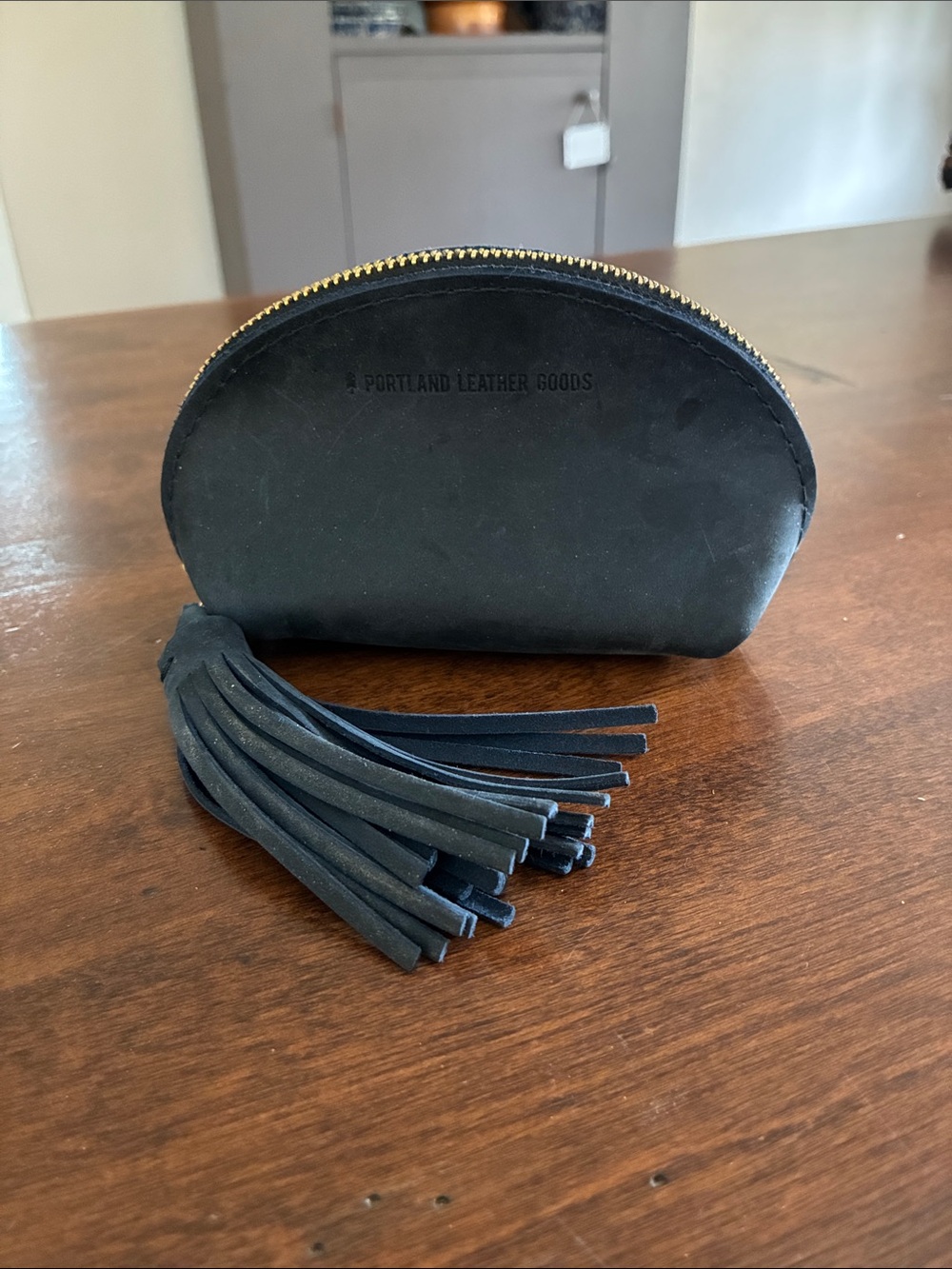 Portland Leather taco tassel pouch in deep dark blue